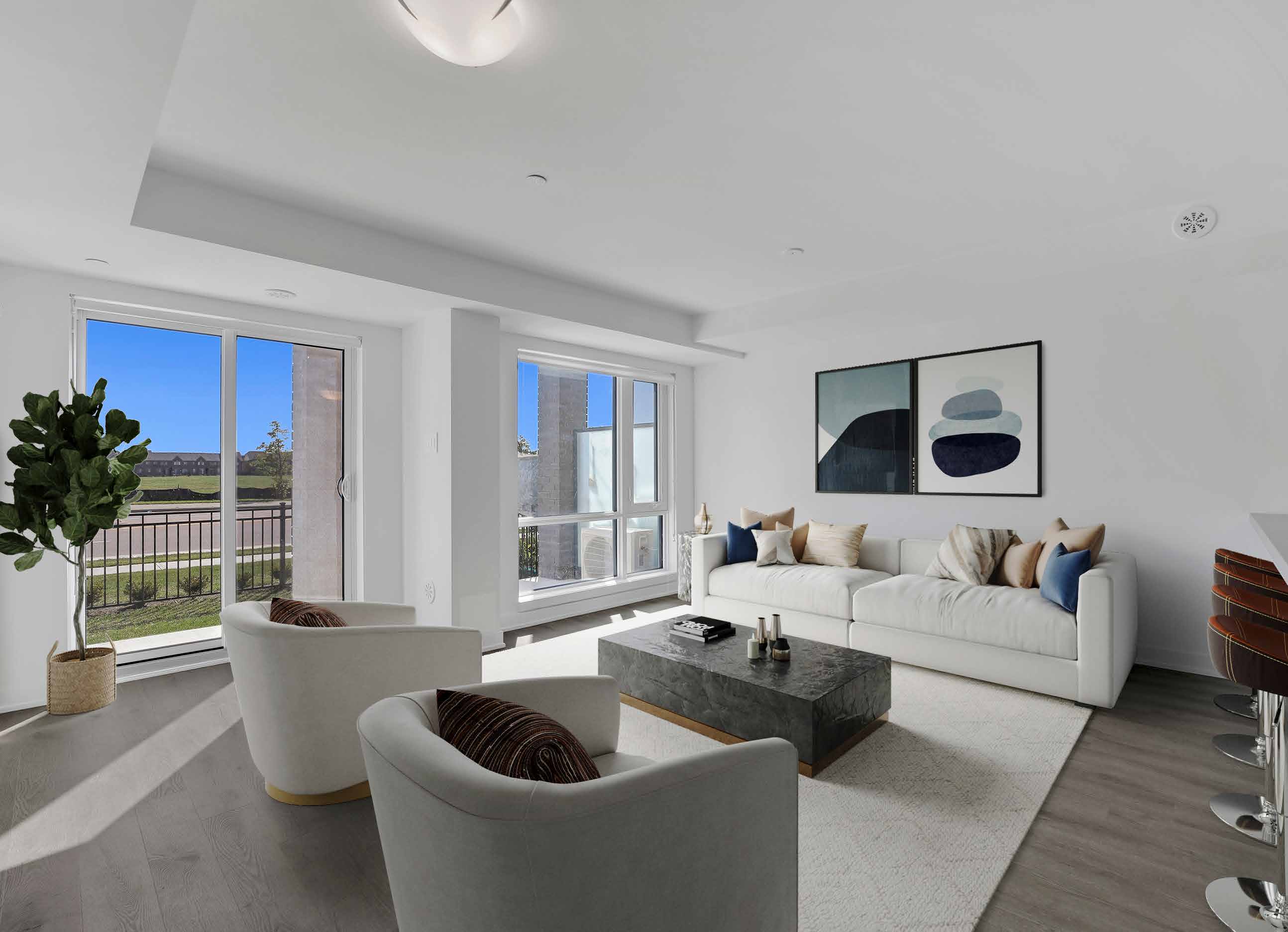 Bright Diamond model living room with large windows at Countryside Urban Towns